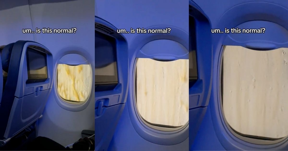 Brownish liquid sliding down an airplane window