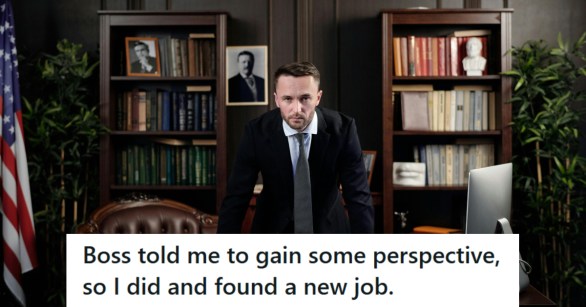 Man dressed in suit standing behind his desk