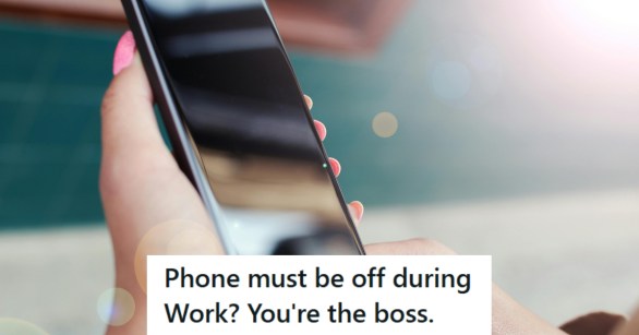 Woman holding cell phone and powering it off