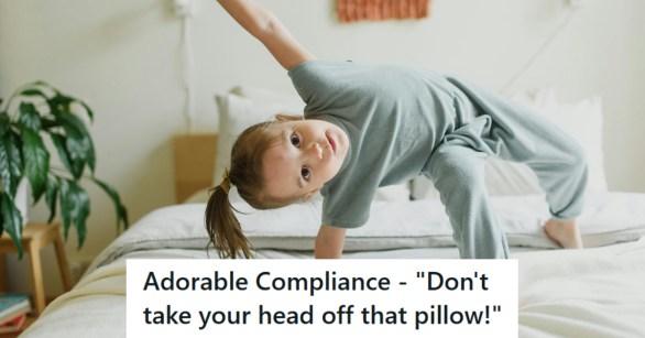 Little girl goofing off and having fun on a bed