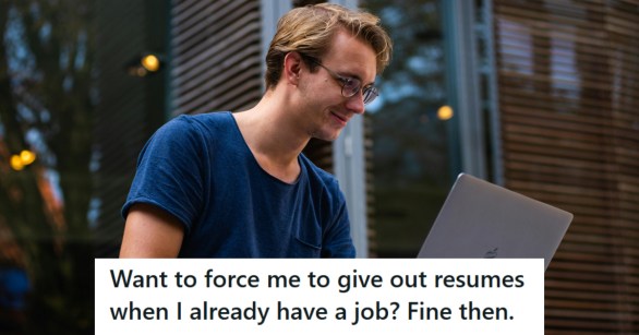 Man looking at his computer and smiling