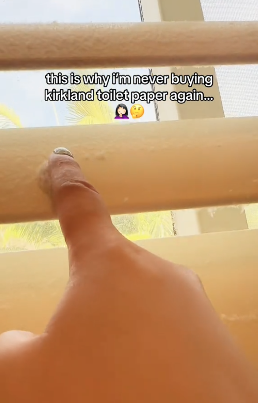 Touching dust on blinds.