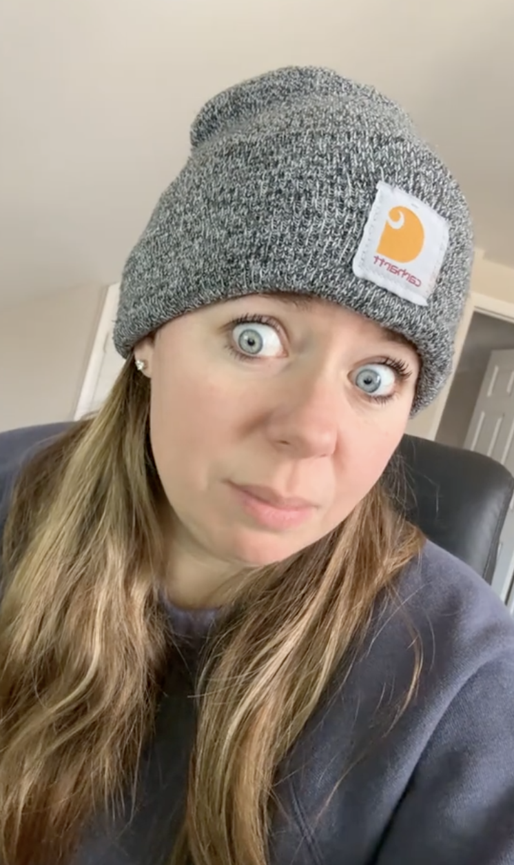 woman looking confused with big eyes