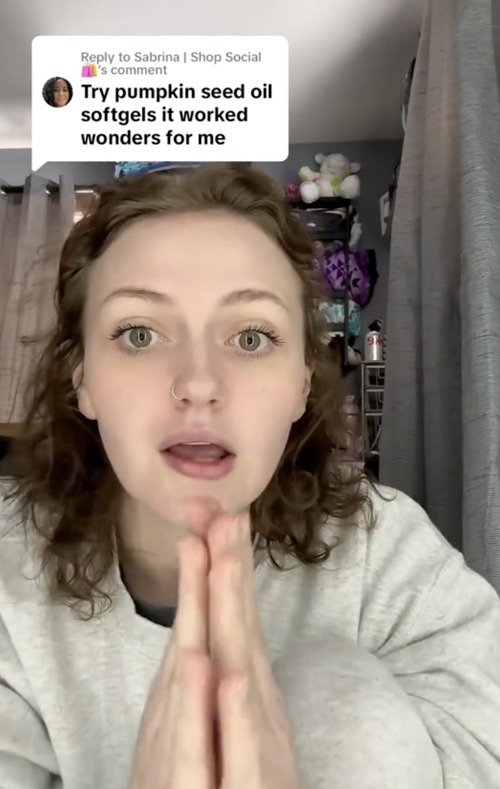 woman with hands in praying position