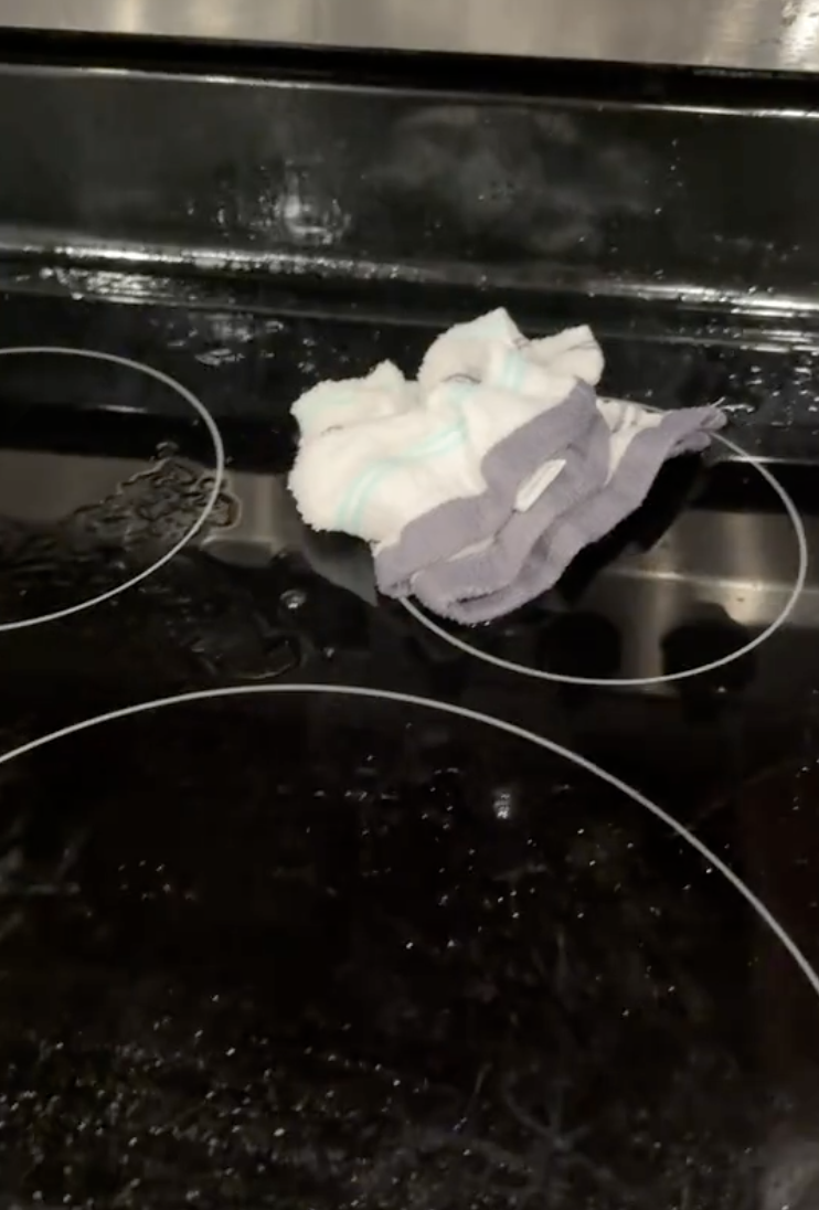a wet rag on a stovetop