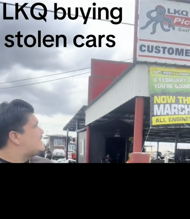 man looking up a business sign