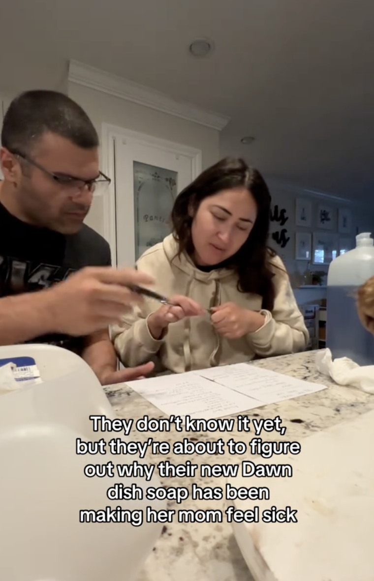two people looking over ingredients