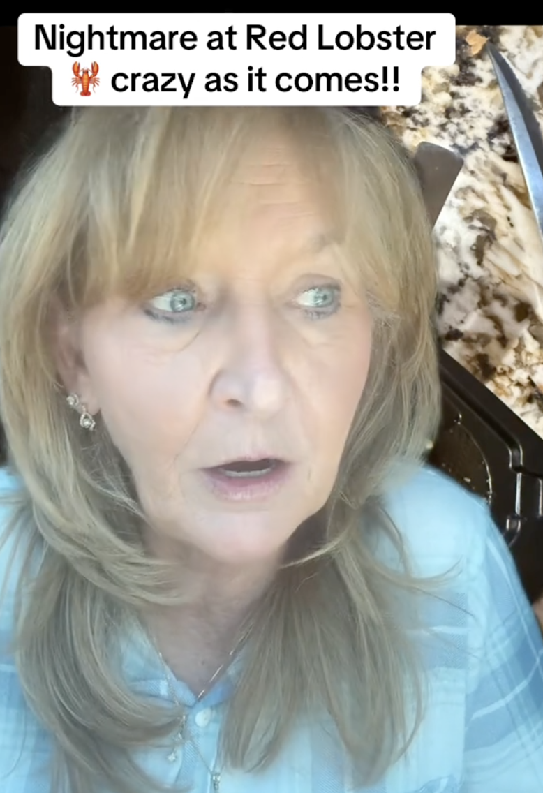 older woman wearing a blue shirt