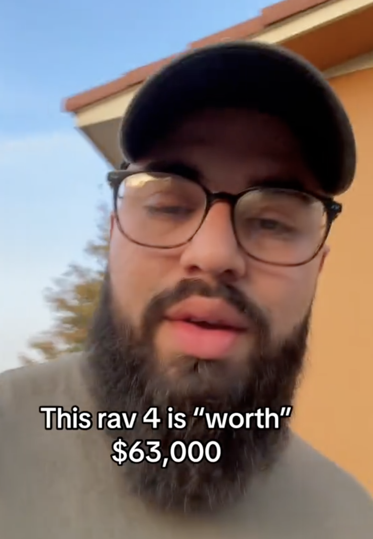 man wearing glasses and a hat