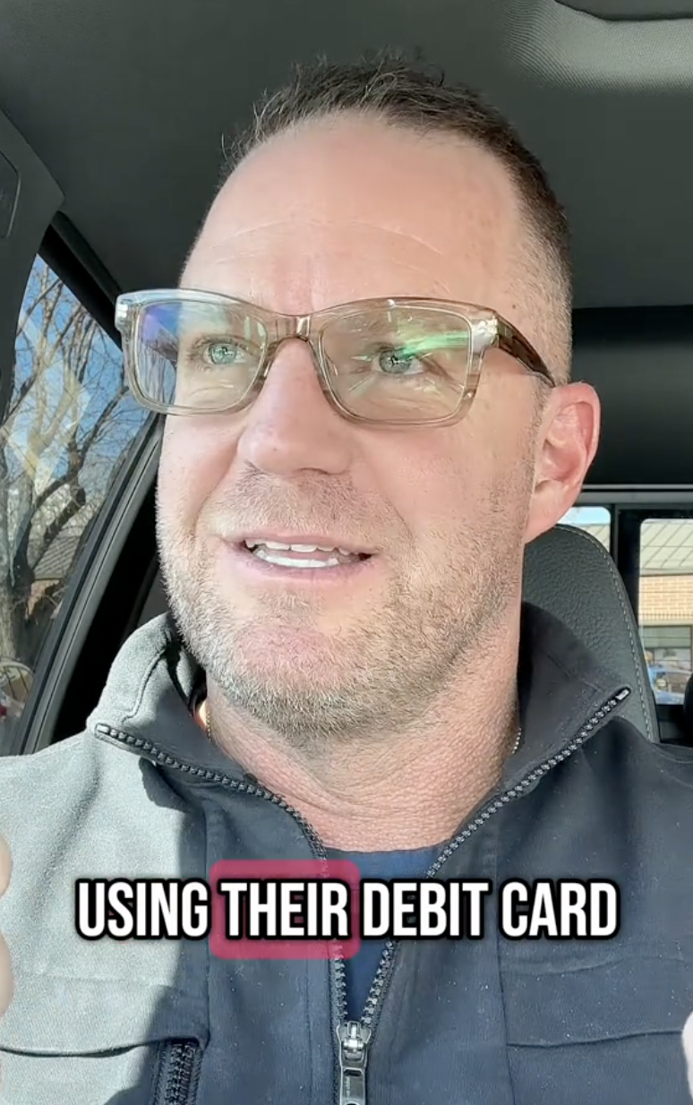 man giving financial advice in his car