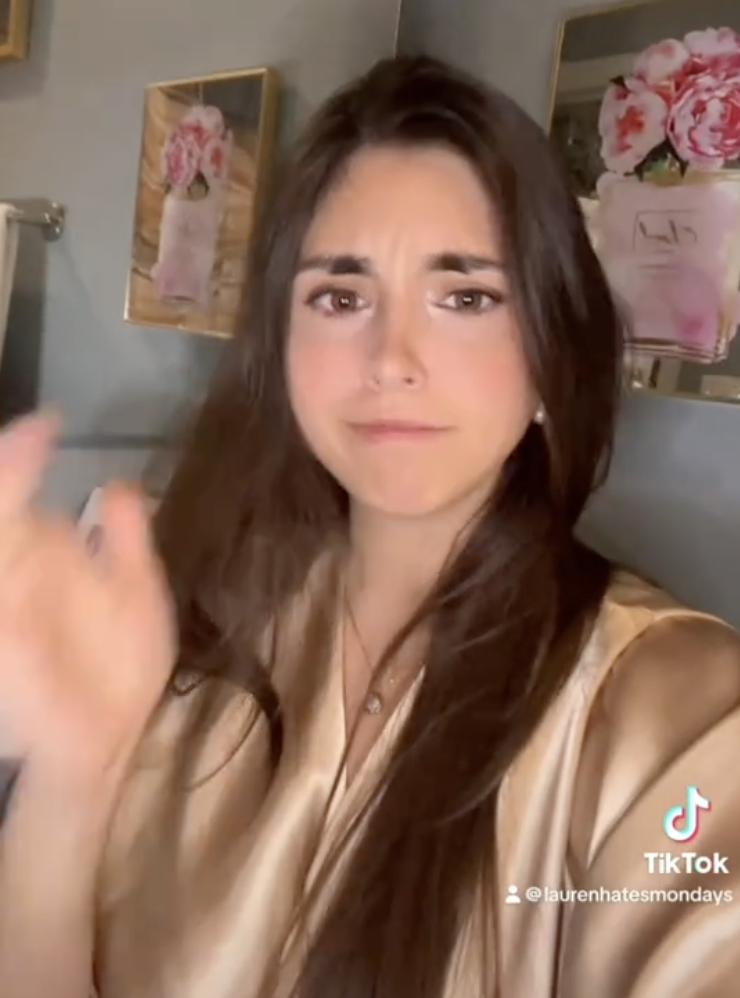 woman with a flustered expression