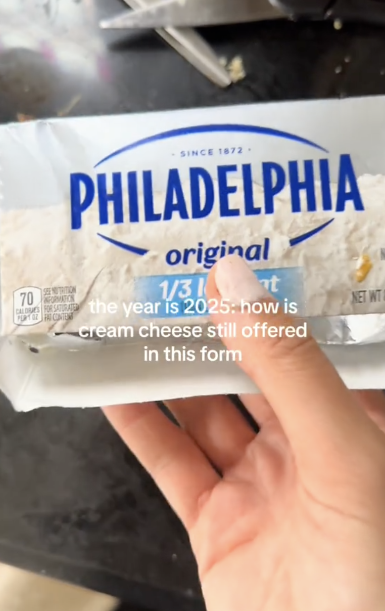 woman with a cream cheese container