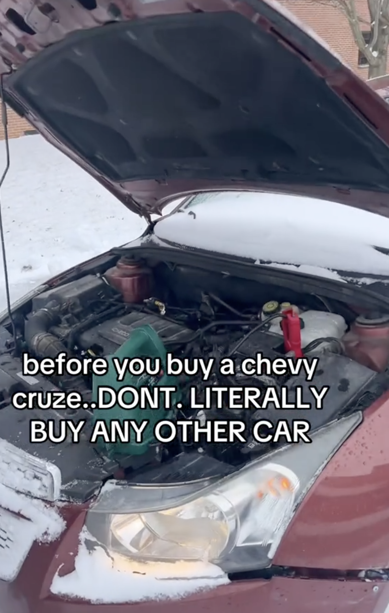 a car with the hood popped