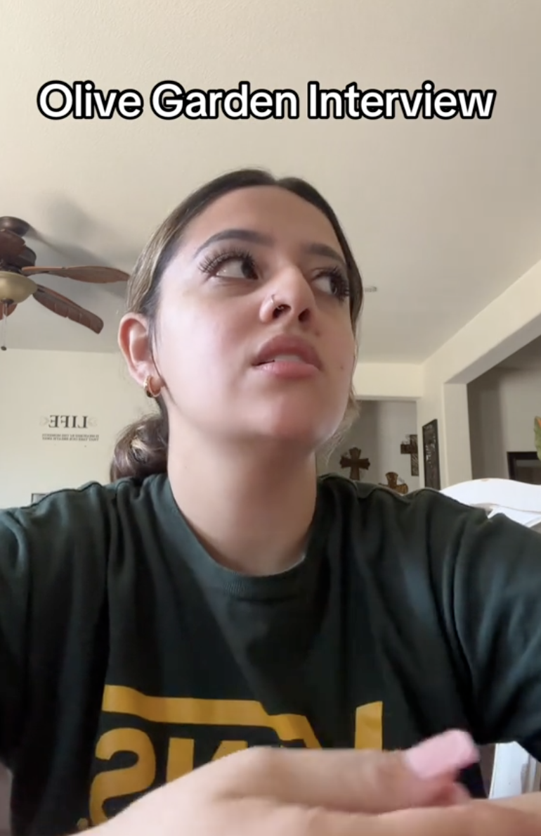 woman wearing a green shirt