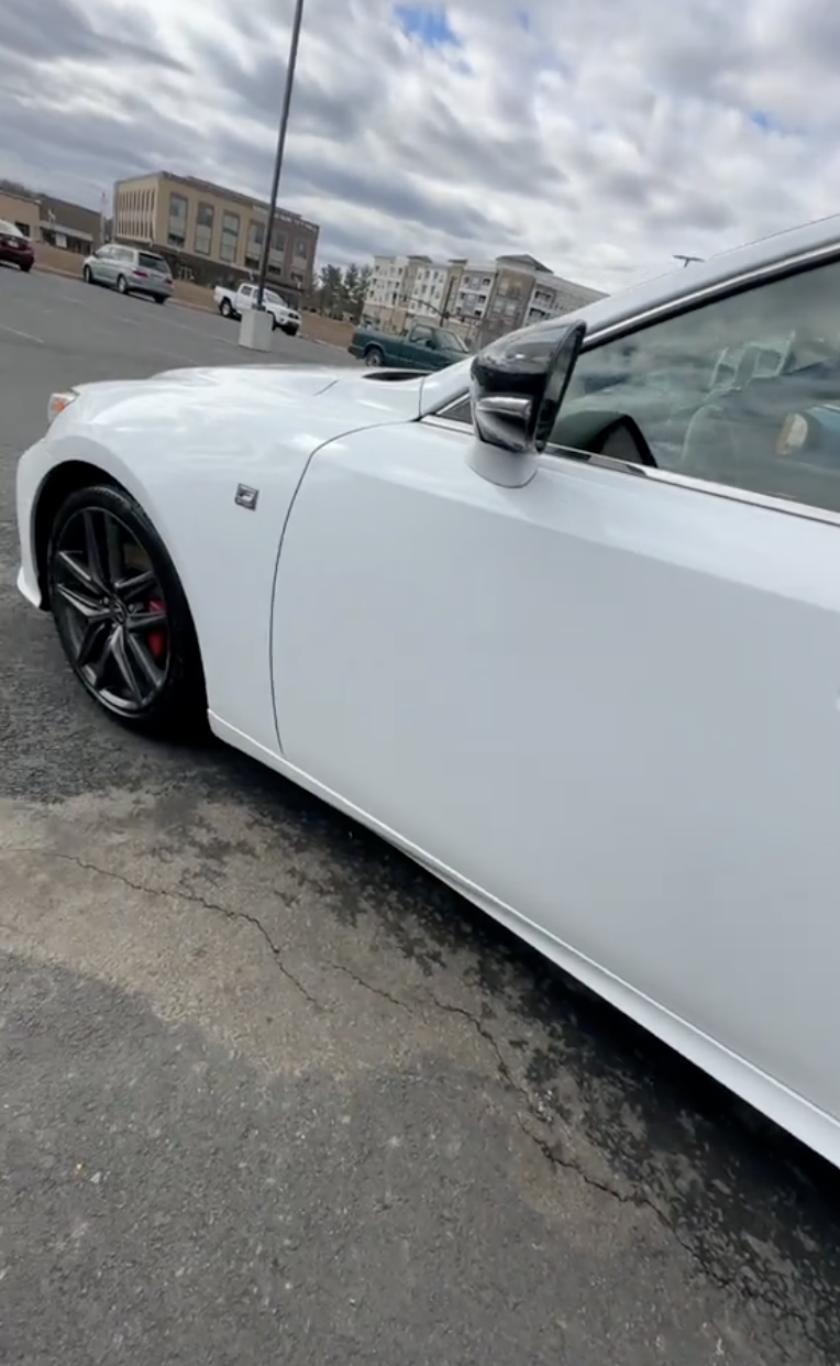 a white car in a parking lot