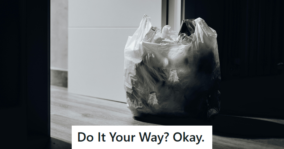 Full trash bag sitting in the floor