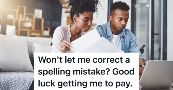 couple looking at paperwork and laptop