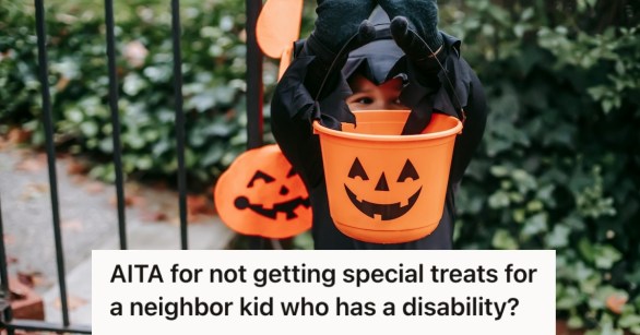 A little boy in Halloween costume holding a pumpkin basket for trick or treat