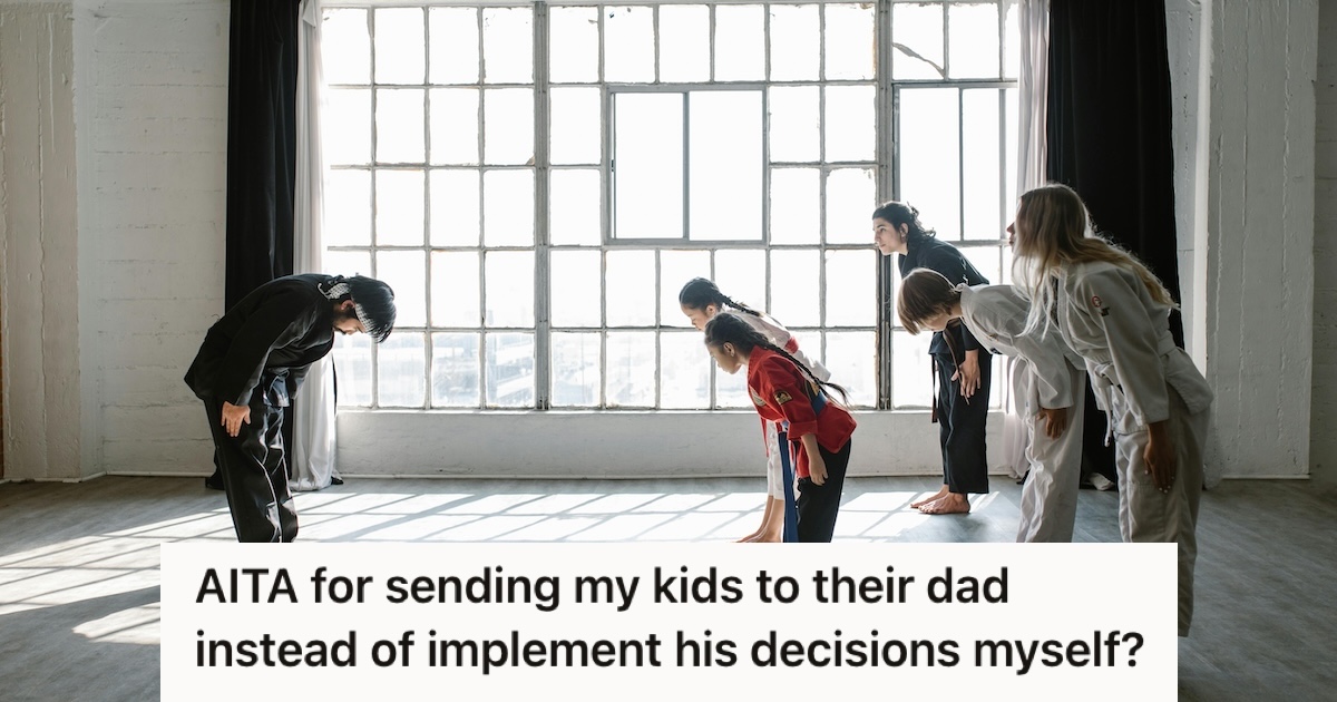Martial arts class with the coach and the students bowing to each other