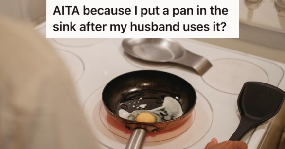 Man frying an egg on the stove with a pan