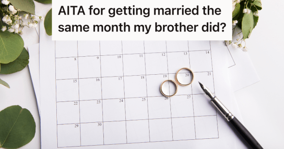 two gold wedding rings, a pen and flowers on top of a calendar