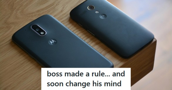 Two cell phones laying on a dining room table