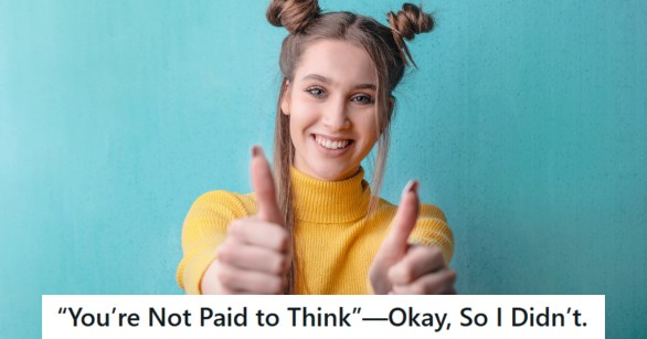 Woman smiling and giving two thumbs up