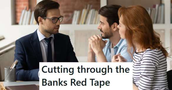 Bank manager talking to customers