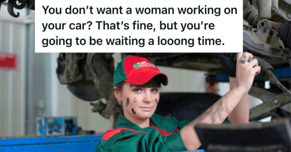 female mechanic working under a car