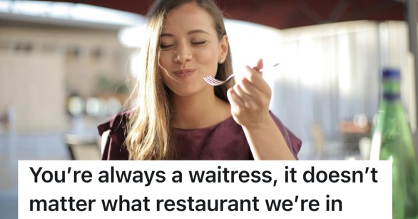 pretty woman eating at outdoor restaurant