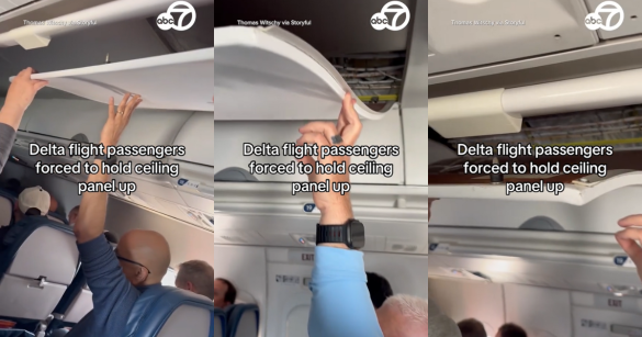 A broken ceiling panel on a Delta flight