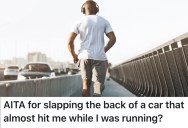 A Car Almost Hit A Jogger While He Was Running, So He Smacked The Car With His Hand As It Drove By