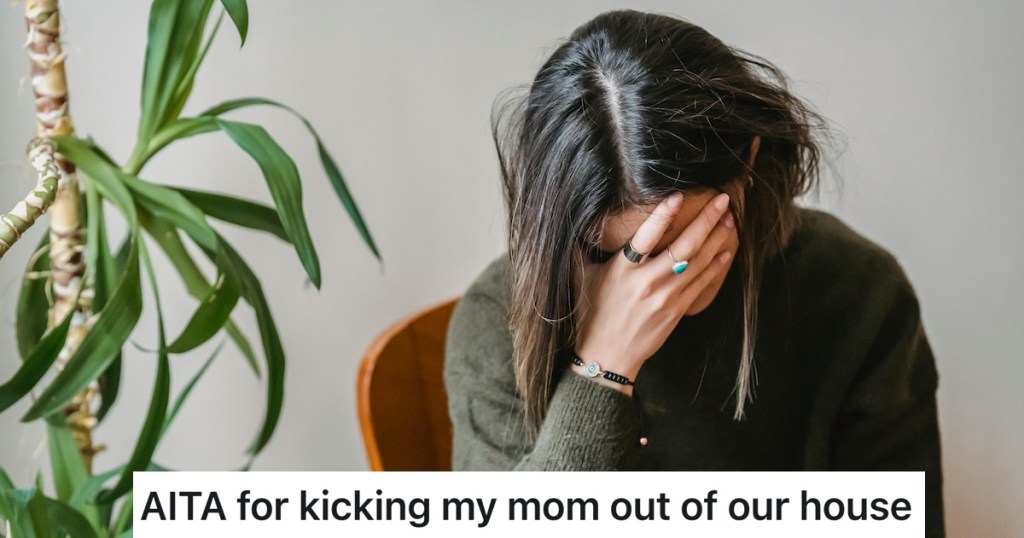 woman with head in hands