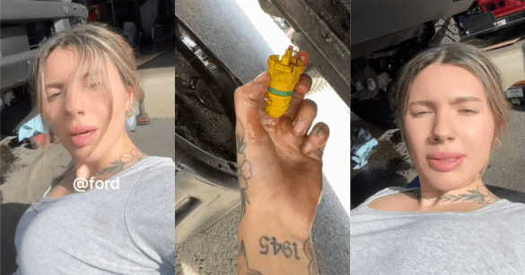 woman working on a car