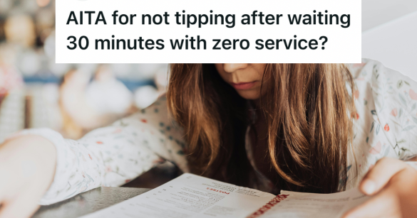 woman looking at a menu at a restaurant