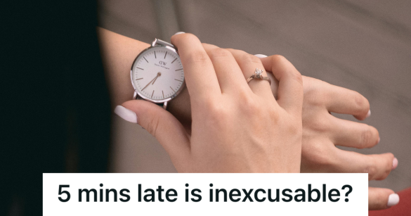 woman looking at her silver watch