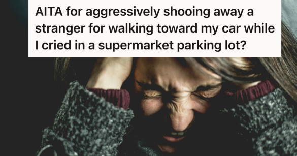 woman looking upset putting hands over her ears