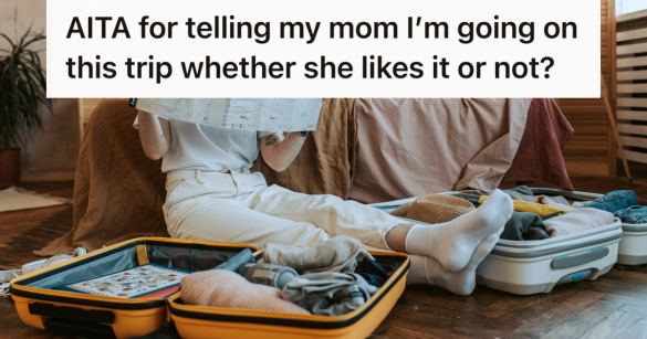 woman packing her suitcase and looking at a paper map