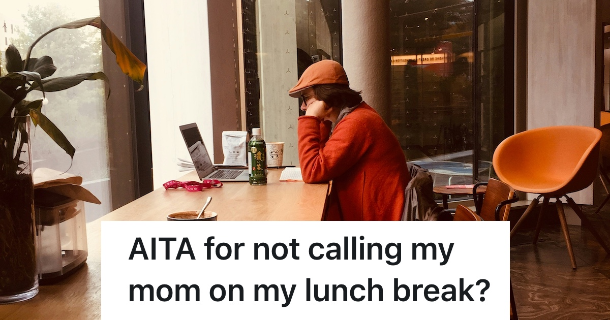 person looking at laptop in office