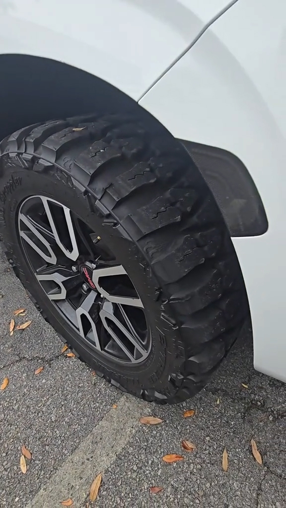 A GMC Yukon with off-road tires