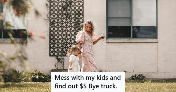 A mother and her daughter are walking outside on a nice day