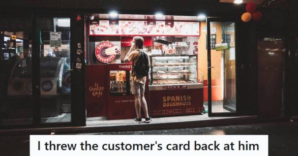 Man standing at a Spanish doughnut counter waiting for service