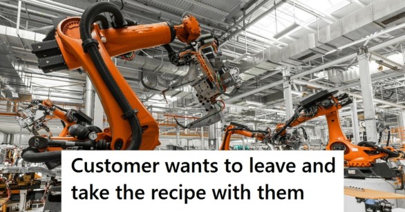 Factory with orange robotic machines