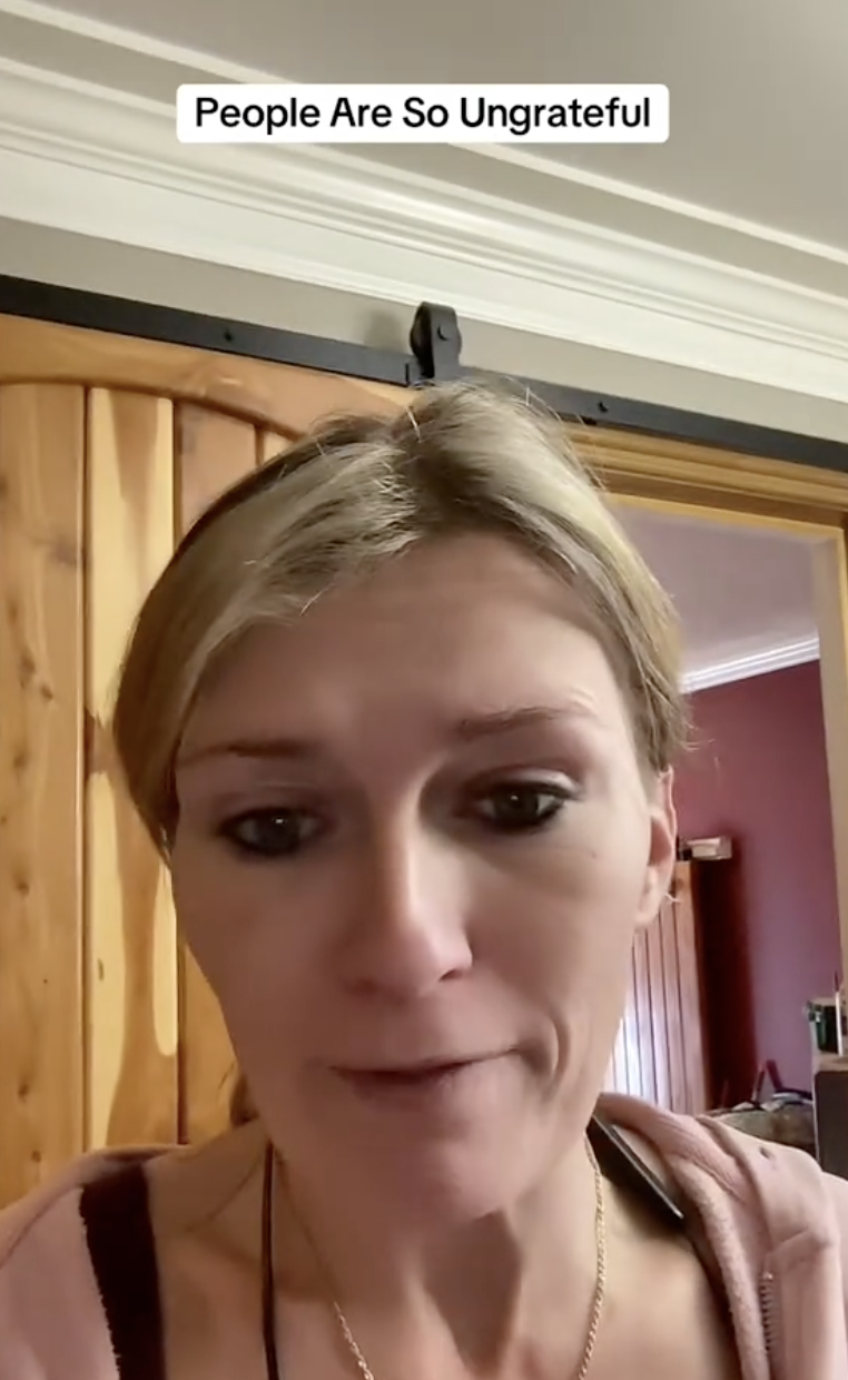 woman talking in her kitchen