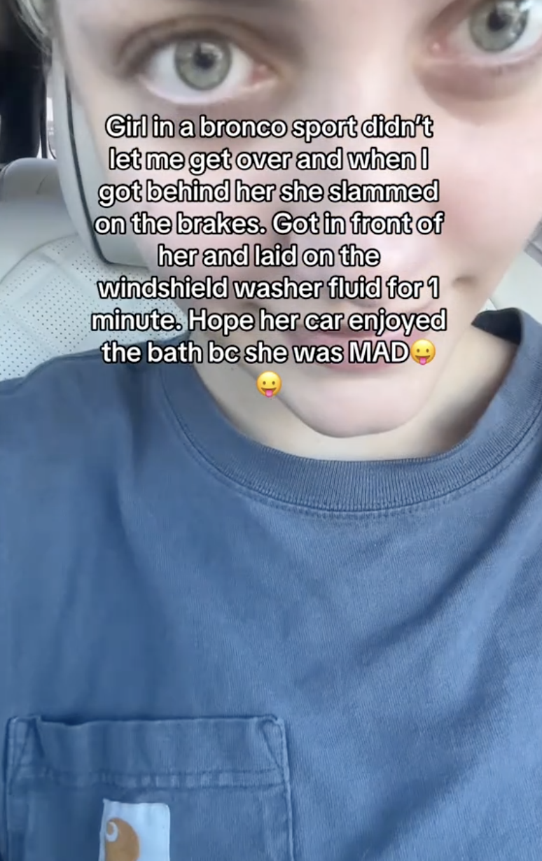 woman with blonde hair and a blue shirt