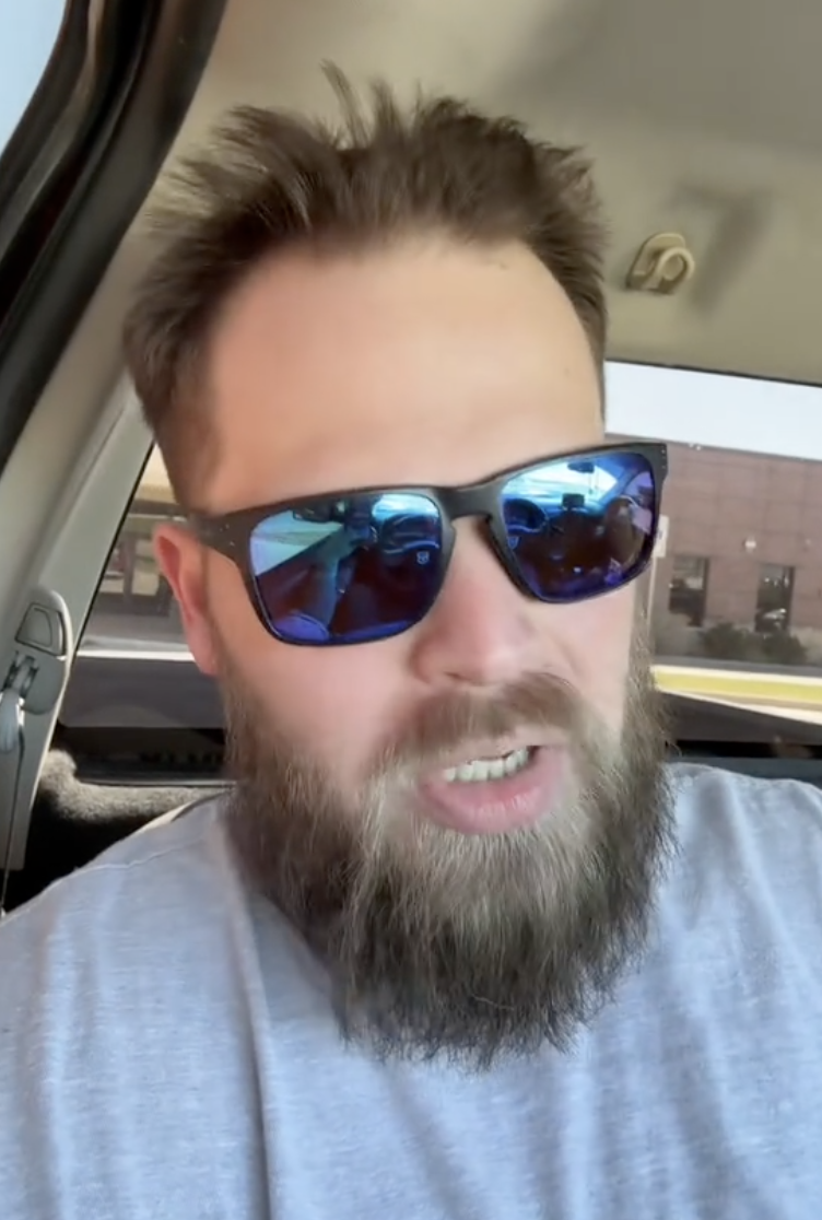 man with a beard and sunglasses