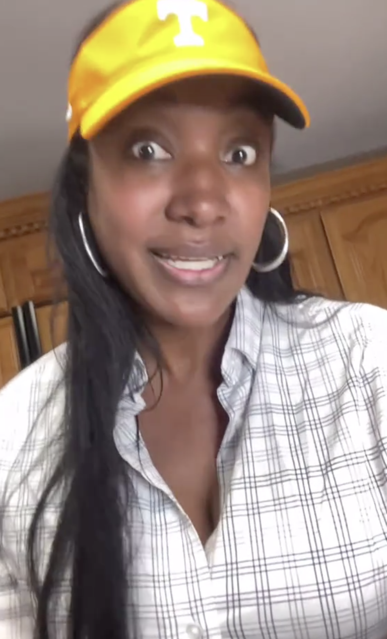 woman talking in her kitchen