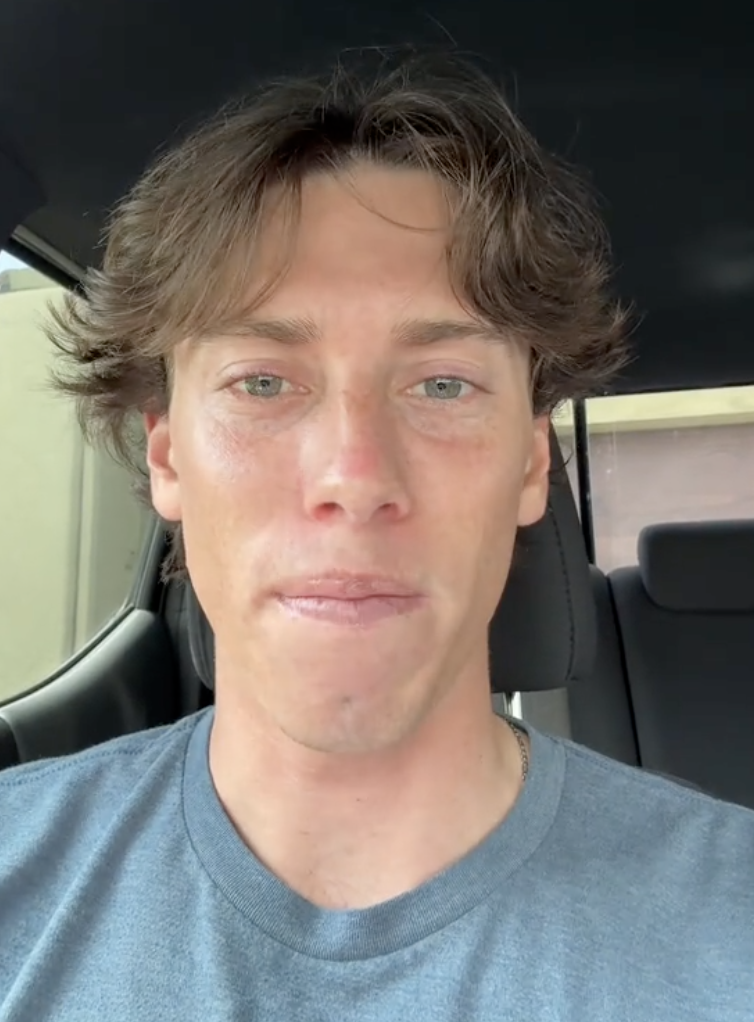 young man in his car