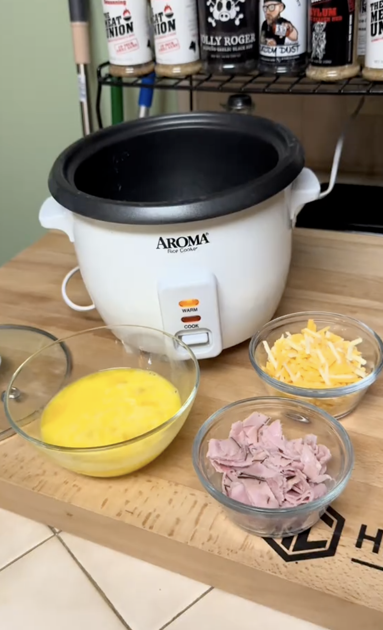 a rice cooker and ingredients