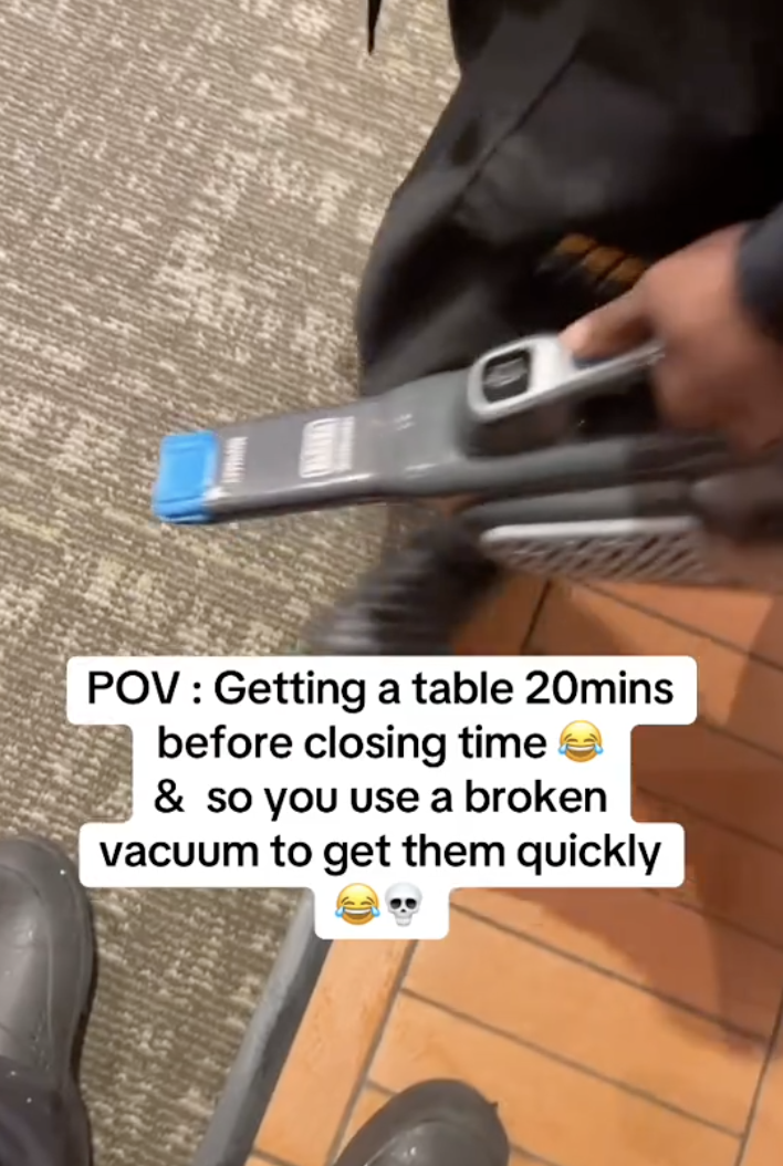 person holding a vacuum